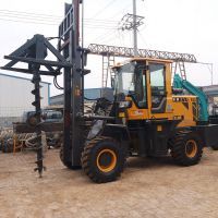 寧夏植樹打坑機合金鉆尖 高效施工利器與深度6米越野叉車打樁機建筑工地實景解析